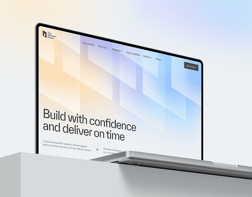 Software consultancy website screens with a charcoal service page, pale editorial case-study cards, and amber accents.